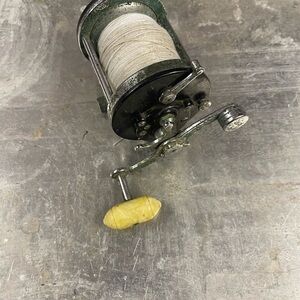 Penn 200 Vintage Fishing Reel with Yellow Handle